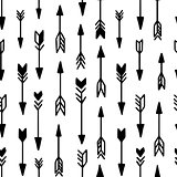 Seamless hand drawn geometric tribal pattern with arrows. Vector navajo design.