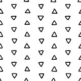 Seamless hand drawn geometric tribal pattern with triangles. Vector navajo design.