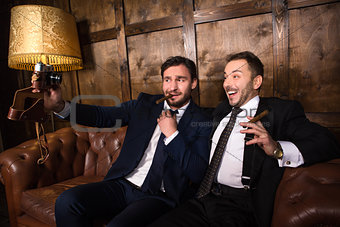 Rich businessmen with cigars