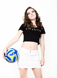 Young beautiful curly girl with professional make-up, holding a ball