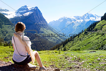 woman enjoying glacier national park