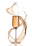 Glass of pink champagne with splashes and bubbles