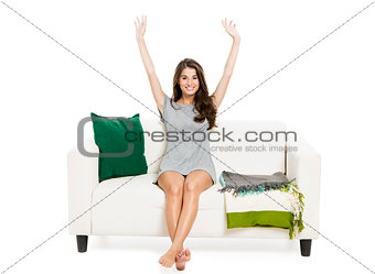 Beautiful woman relaxing on a sofa