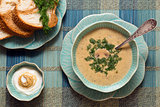 Cheese soup with fresh bread and sauce