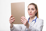 young doctor woman with a large digital tablet
