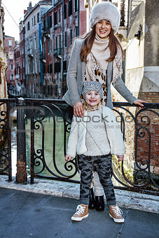 mother and daughter tourists in Venice, Italy in winter
