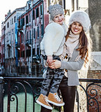 mother and daughter travellers in Venice, Italy in winter