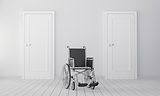 Wheelchair in room with two closed door