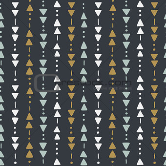 Seamless hand drawn geometric tribal pattern with triangles and dots. Vector navajo design.