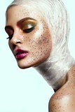 Close up of woman face with glitter on face