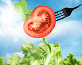 Background of mixed salad with a fork
