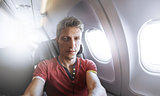 man photographer in airplane