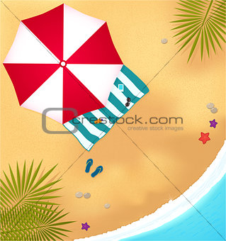 beach with waves, umbrell and bright towel