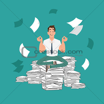 Businessman meditating in peace on a pile of documents