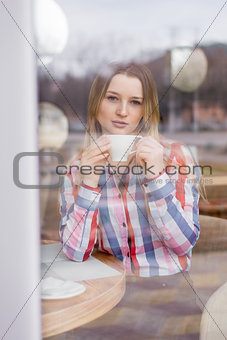 portrait of a girl in a cafe