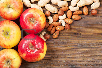 Nuts and red apples