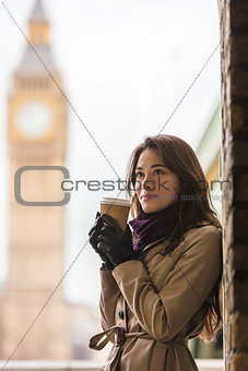 Woman Drinking Coffee by Westminster Bridge, Big Ben, London, En