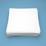 Stack of white paper on blue background