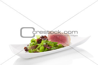 Delicious tuna steak with salad.