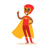Boy Pretending To Have Super Powers Dressed In Red Superhero Costume With Yellow Cape And Helmet Smiling Character