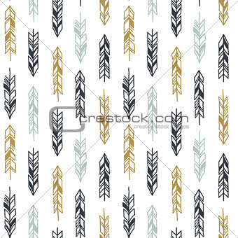 Seamless hand drawn geometric tribal pattern with feathers. Vector navajo design.