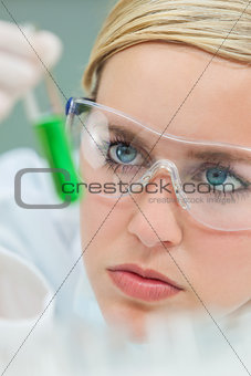 Female Woman Research Scientist With Test Tube In Laboratory