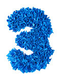 Three. Handmade number 3 from blue scraps of paper