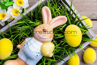Easter holiday bunny with eggs and flowers 