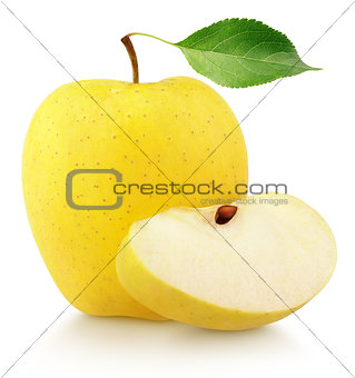 Yellow apple with slice and leaf