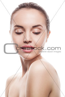 closeup portrait of young woman with clean fresh skin