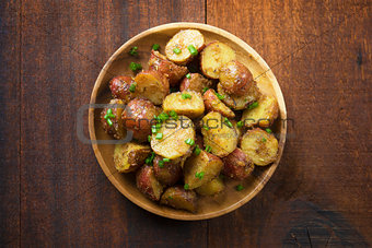 Oven baked potatoes on plate