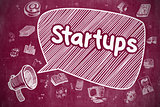 Startups - Doodle Illustration on Red Chalkboard.
