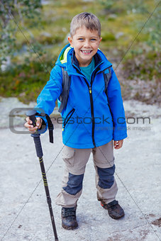 Hiking boy in the mountains