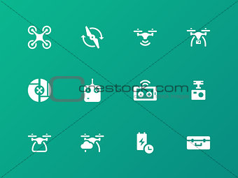 Quadcopter with camera on map  icons on green background.