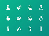 Erlenmeyer flasks flask tube icons on green background.
