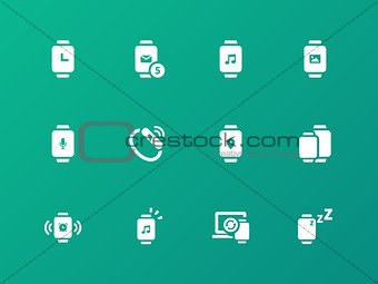 Collection of smart watch app icons on green background.