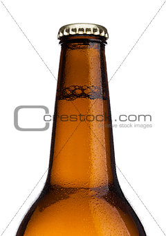 Brown glass beer bottle with yellow cap isolated