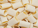 dried italian paccheri tube pasta food background