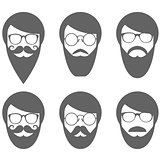 Face of bearded man - hipster in glasses with moustache