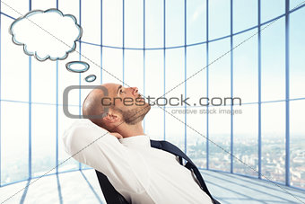Successful Businessman relax and think
