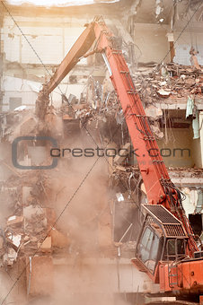 Special machine demolishes house