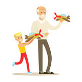 Grandfather And Boy Playing Toy Planes, Part Of Grandparents Having Fun With Grandchildren Series
