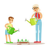 Grandmother And Boy Watering Plants, Part Of Grandparents Having Fun With Grandchildren Series