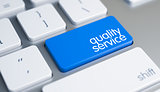 Quality Service - Text on the Blue Keyboard Button. 3D.