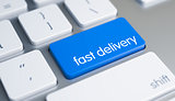 Fast Delivery - Text on the Blue Keyboard Button. 3D.
