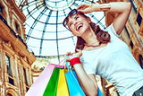 Fashion woman with shopping bags in Galleria Vittorio Emanuele