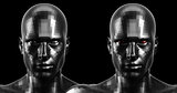 3d rendering. Two faceted black android heads looking front on camera