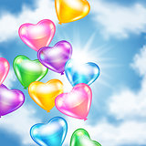Balloons in shape of heart in the sky