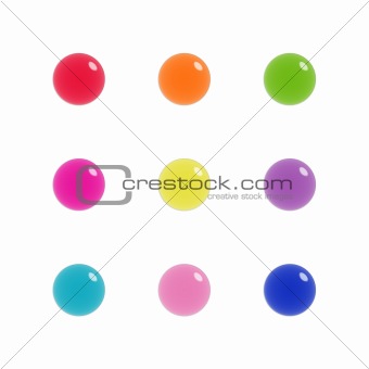 Nine glass orbs of glass in bright colours