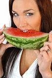 brunette eating a watermelon